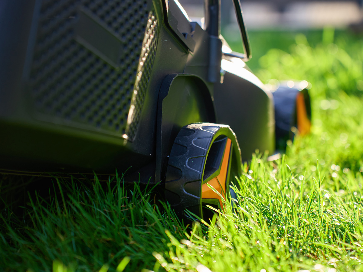 A perfectly manicured green lawn in a suburban Edmonton neighborhood